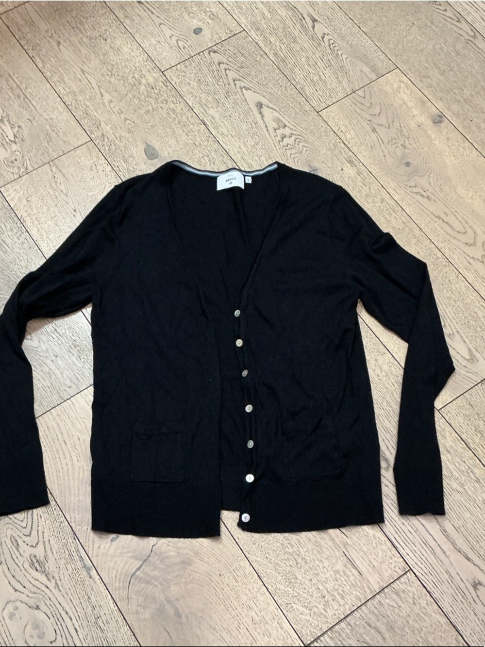 Woman’s C&A black v neck button up light cardigan sweater. Medium.A great basic.